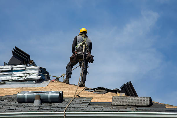 Professional Gutter Installation technician working in Creston, IA
